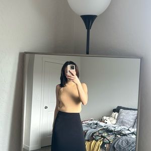 ribbed nude colored tank top with a high rise neck